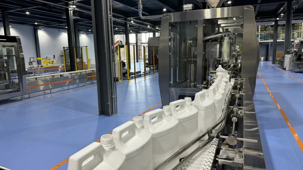 máquina-llenadora-Cintas-entrada-de-bidones